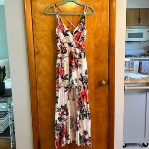 Francesca’s floral high low romper. Size S